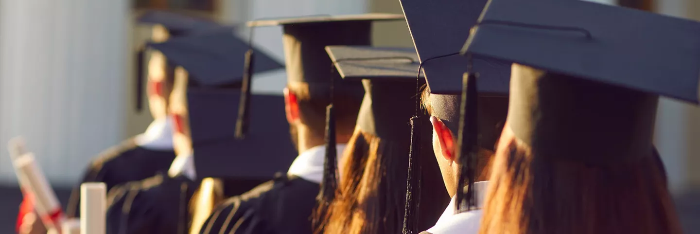 University graduates walking